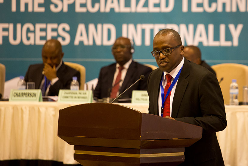 Claude Nikobisanzwe, the permanent secretary at Ministry of Foreign Affairs, Cooperation and East African Community Affairs, speaks at the opening of a weeklong meeting on the adop....