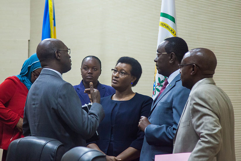 Murekezi (L) and leaders of the Lower House and Senate chat after the meeting at Parliament yesterday. / Nadege Imbabazi
