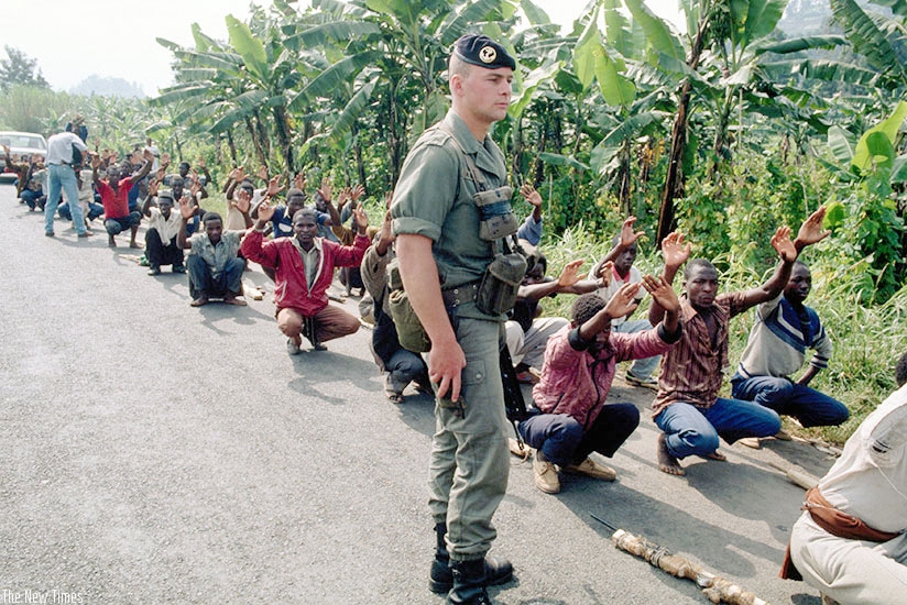 A French soldier supervises the training of Interahamwe militiamen, who killed more than 1 million Tutsi during the Genocide in 1994. (File)