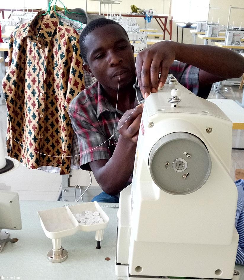 A Burera Garment Factory employee at work. The textile sector in the region has been challenged to find ways to improve production, create jobs. / File.