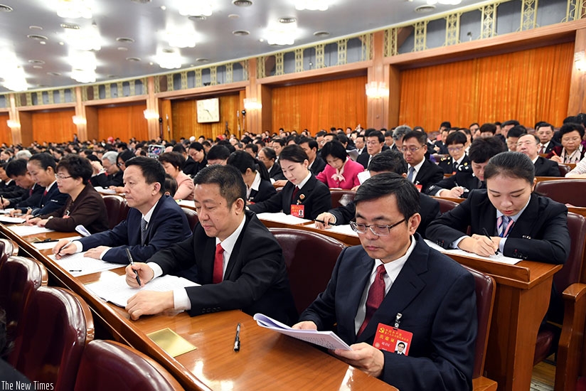 Delegates attend the 19th National Congress of the Communist Party of China (CPC) at the Great Hall of the People in Beijing, capital of China, Oct. 18, 2017. The CPC opened the 19....