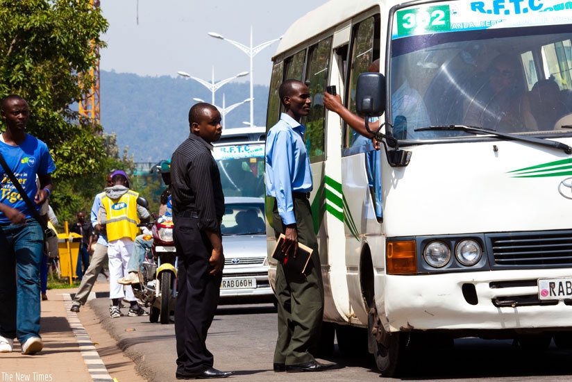 Passengers board an omnibus at Kimironko bus park. File.
