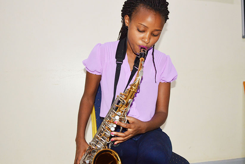 Stella Tushabe plays the saxophone mainly at church, weddings or for friends. / Sam Ngendahimana
