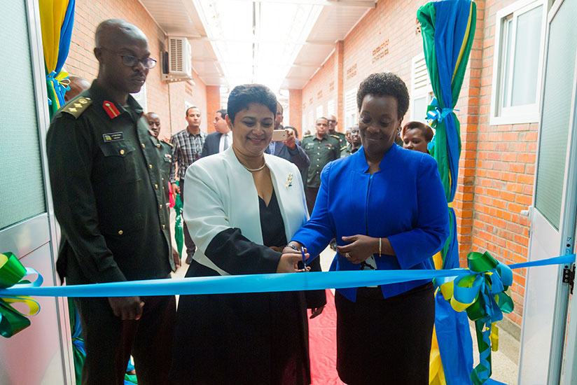 L-R: Col Dr Jean-Paul Bitega, the Director General of Rwanda Military Hospital-Kanombe, looks on as Egyptian Ambassador to Rwanda Namira Nabil Mohamed Elmahdy Negm and the Minister....