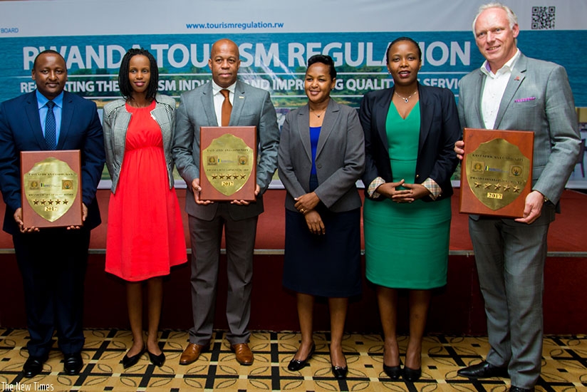 A group photo of Youth minister Rosemary Mbabazi (4th from left), Rwanda Development Board chief executive Claire Akamanzi (2nd from right), and RDB chief tourism officer Belise Ka....