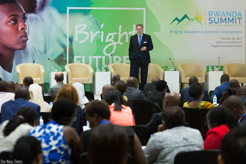 Dr Spencer Niles, senior vice-president for research at Kuder, speaks at the career summit in Kigali yesterday. Timothy Kisambira.
