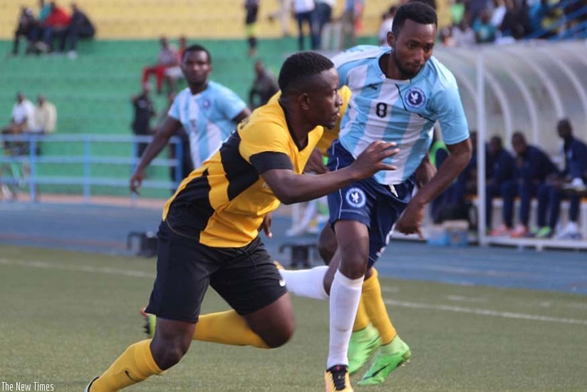 Jean Claude Zagabe, left, seen here up against Police FC forward Justin Mico, will again captain Mukura in the absence of Hussein Cyiza. Courtesy