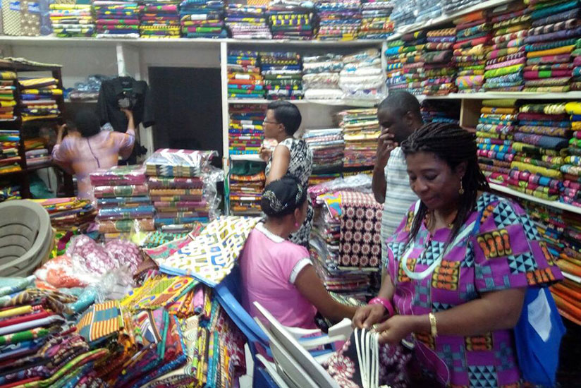 Inside one of the local shops. Accra has a number of shops that sell African fabrics. / Julius Bizimungu