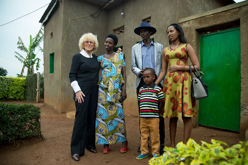 Leonille Mutsindakazi's family with Barbara Margolies, Head of International Organisation for Women and Development. / Timothy Kisambira