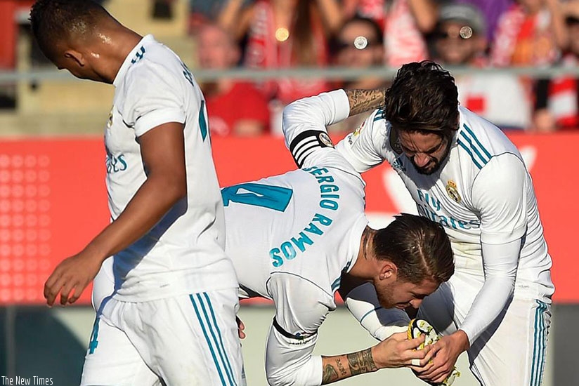 Sergio Ramos kissed the boot of Isco after the playmaker opened the scoring for his side. (Net photo)