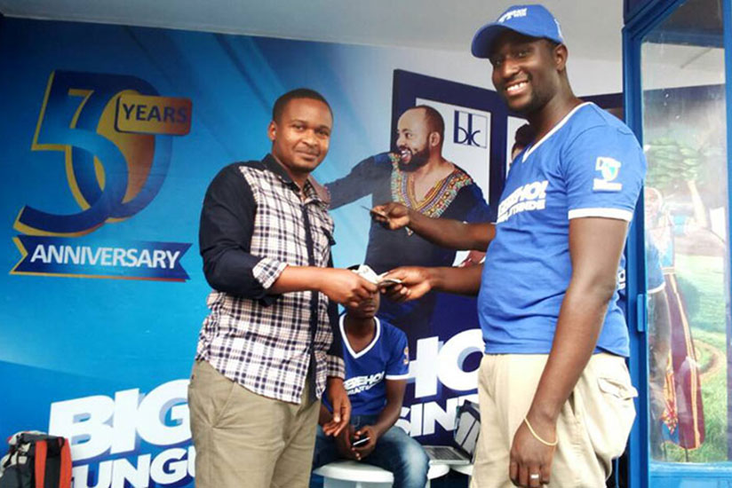One of the winners during Bank of Kigali 'Bigereho Na BK' savings promotion. The bank says the drive has brought in about Rwf1 billion into its coffers in the past 10 weeks. 