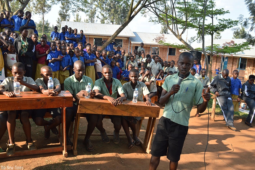 Pupils during a school debate. Working hard helps you to learn more and become smarter. / Dennis Agaba.
