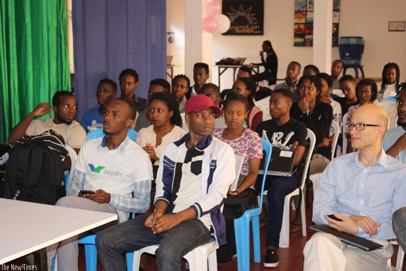 Students of Kepler university follow proceedings at the launch of the Hult Prize  competition. (Francis Byaruhanga)