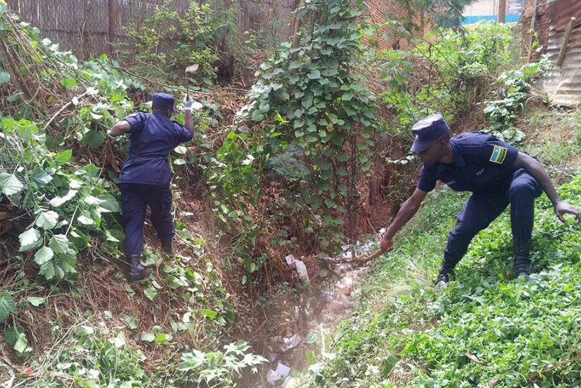 Police officers cleaning some parts of the city during the launch of the security and hygiene campaign.