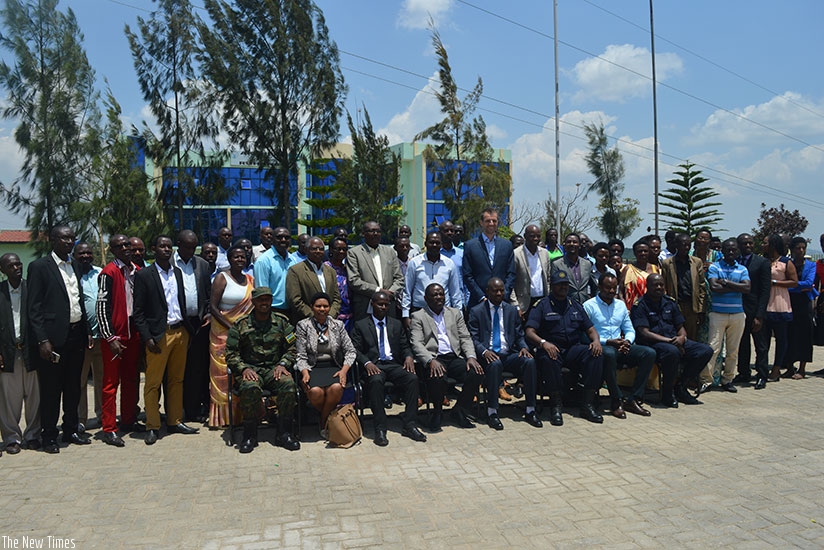 The Minister of State in charge of agriculture, Fulgence Nsengiyumva together with farmers, NGOs staff, District officials and other stakeholders in a group photo during the Cassav....