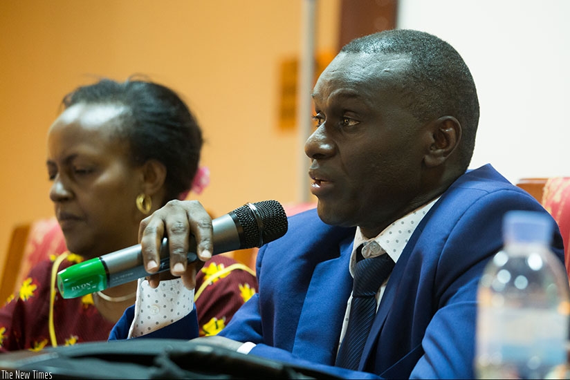 Dr Semwaga speaks at the workshop in Kigali yesterday. (Photos by Timothy Kisambira)