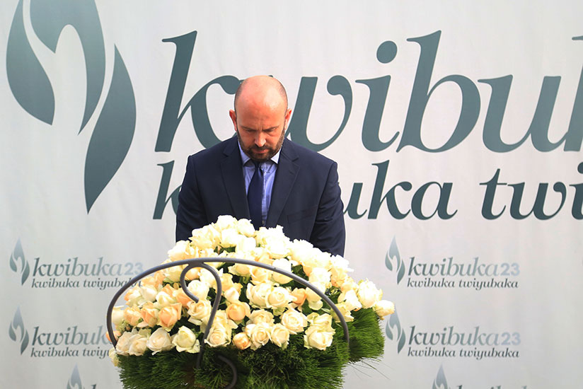 The  UK Special Envoy to the Great Lakes region Simon Mustard lays a wreath on the grave at Kigali Genocide Memorial yesterday  (All photos by Sam Ngendahimana)