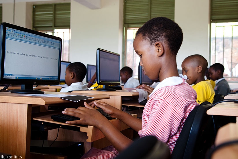 Kigali Parents pupils having a computer lesson.