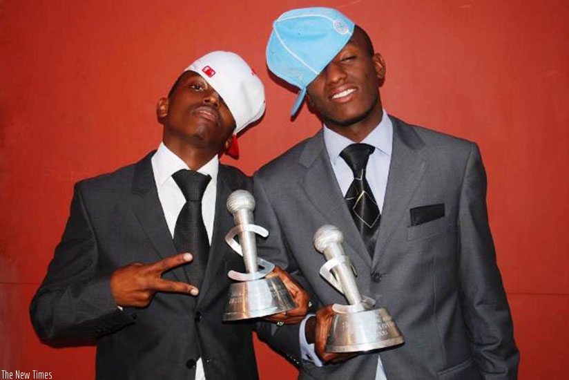 Singers Tom Close (L) and The Ben with their trophies at the 2009 Salax Awards. / File