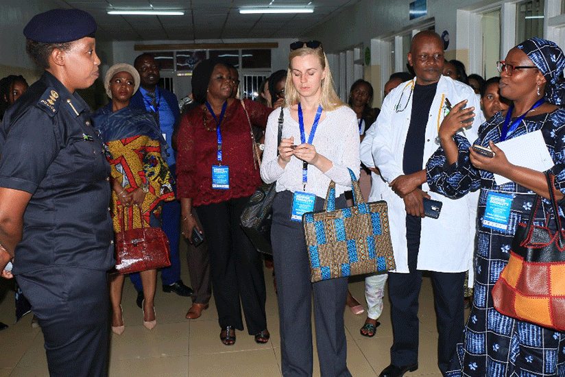 Chief Supt. Lynder Nkuranga (L) receives officials from across Africa for a tour of Isange. Courtesy.