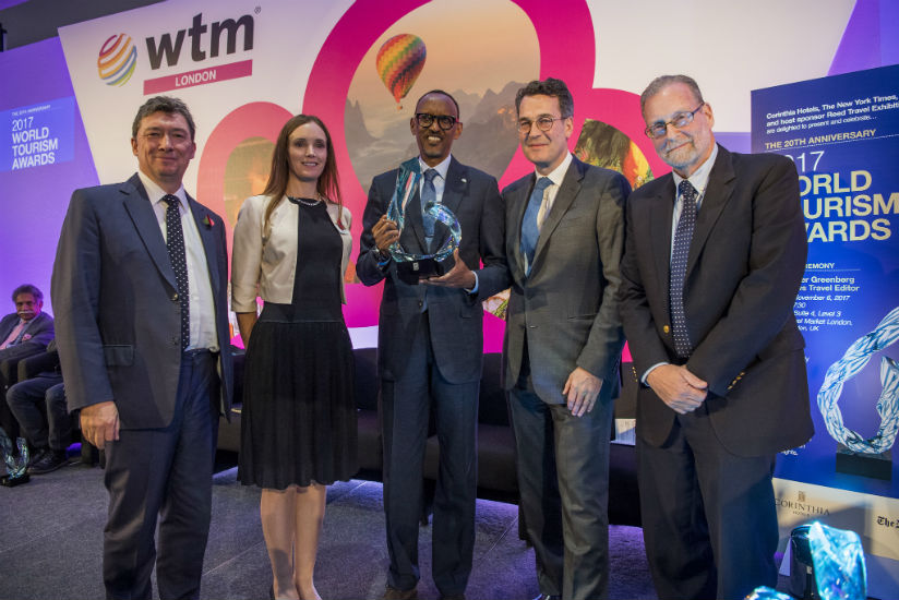 President Kagame poses for a picture with key sponsors upon receiving his award in London, England, yesterday. From left to right;  Matthew Dixon, of Corintha Hotels; Jeanette Gilb....