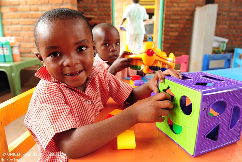Children at an early childhood development centre. Learning about shapes, colours, and numbers is an important way to make your brain strong when you are young. (/u00a9UNICEF Rwanda/2017)