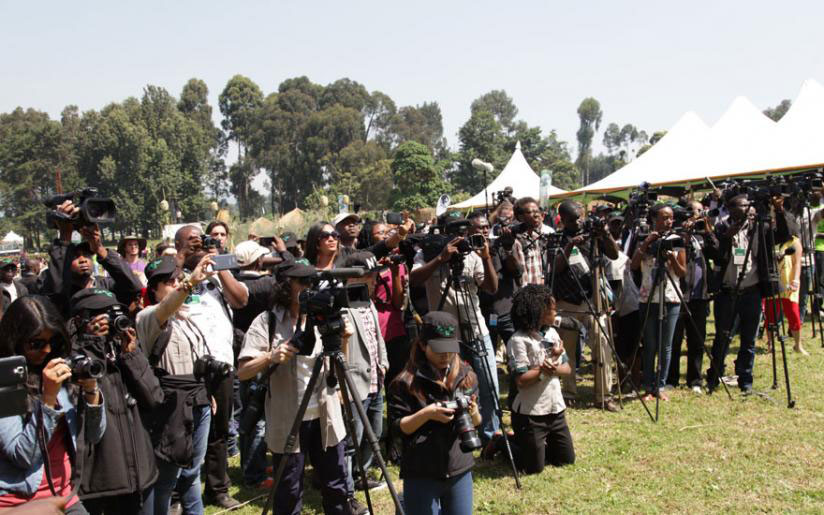 Journalists cover a past gorilla naming ceremony (Kwita Izina) in Kinigi, Musanze District. / File