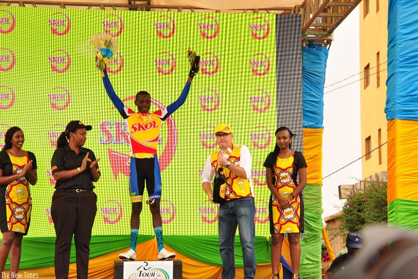 Jean Bosco Nsengimana celebrates on the podium after winning the prologue on the opening day of this year's Tour du Rwanda on Sunday. Sam Ngendahimana.