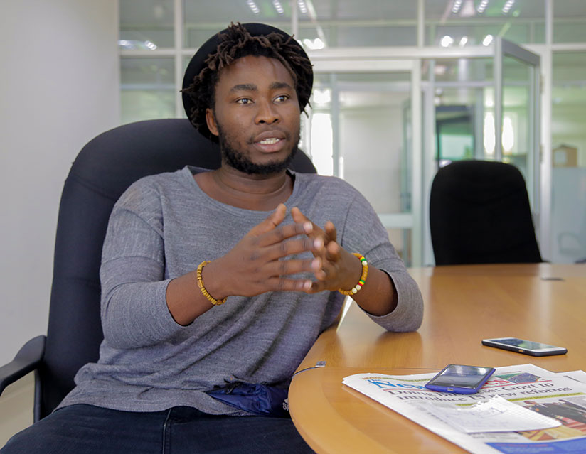Documentary photographer Jacques Nkinzingabo during an interview at The New Times' head office on Monday, November 13. / Faustin Niyigena