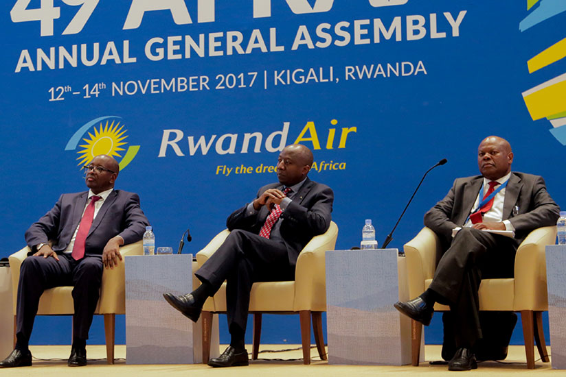 Rwanda's Prime Minister Edouard Ngirente (centre), infrastructure minister James Musoni (left), and Chingosho listen to presentations at AFRAA summit yesterday. / Faustin Niyigena