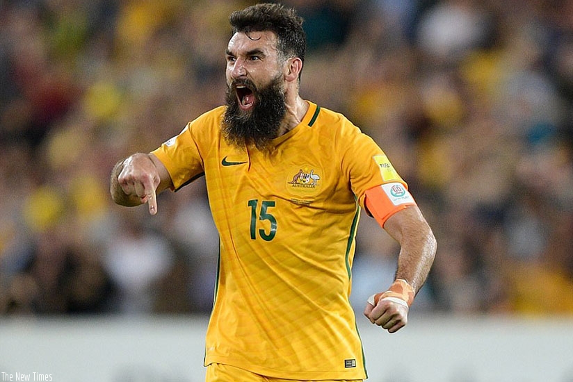 Jedinak celebrates with as much relief as passion after scoring his second goal for Australia in the do-or-die play-off match.