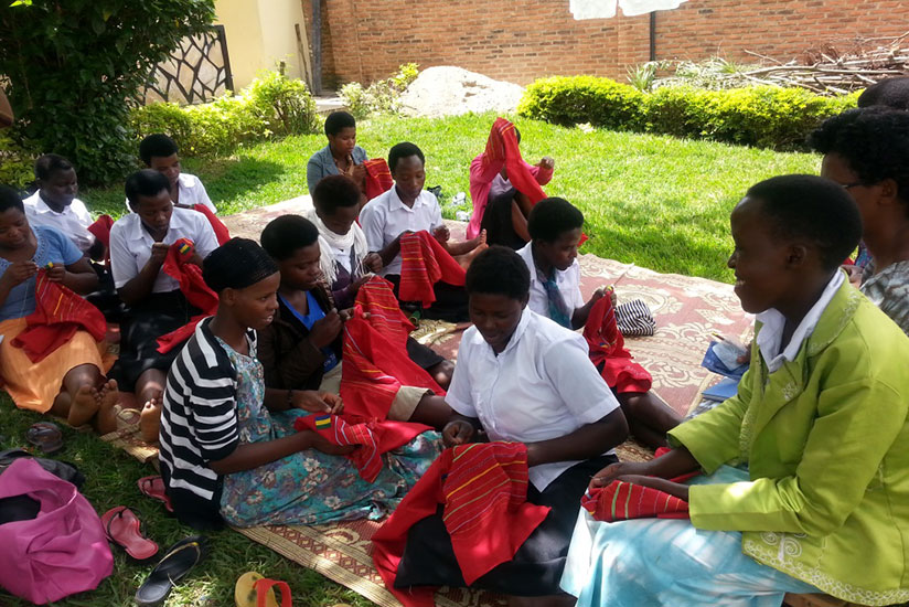 Beneficiaries attending an embroidery class. Courtesy