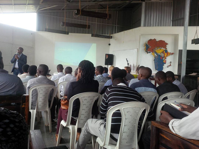 Some of the people who attended the GIS Day event in Kigali listen to presentations. / Joan Mbabazi