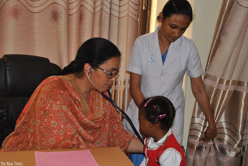 Dr Anuradha Sridhar checks a child with a congenital heart problem. / Lydia Atieno.