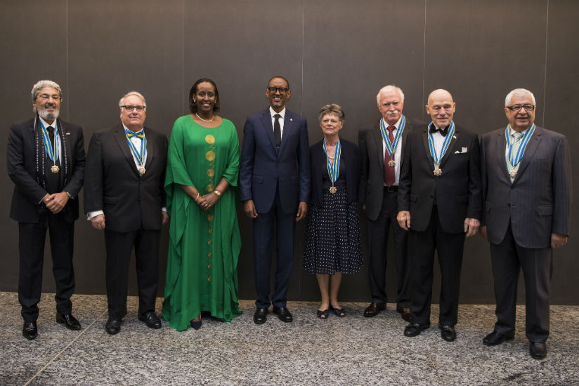 President Paul Kagame with seven Igihango National Order of Friendship medal recipients Hezi Bezalel, Gilbert R. Chagoury, John W. Dick, Dr. Paul Farmer, Howard Buffet, Prof. Linda....