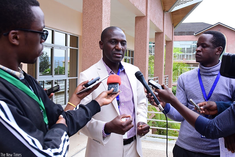 Sanou Dia, from FAO, speaks to journalists after the meeting. (Photos by Michel Nkurunziza)