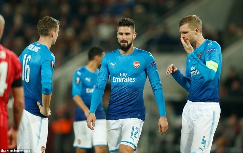 Arsenal's players look frustrated after conceding the only goal in their Group H game away against Cologne. Net photo.