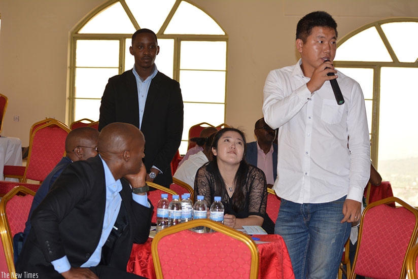 A participant contributes during the meeting. Kelly Rwamapera.