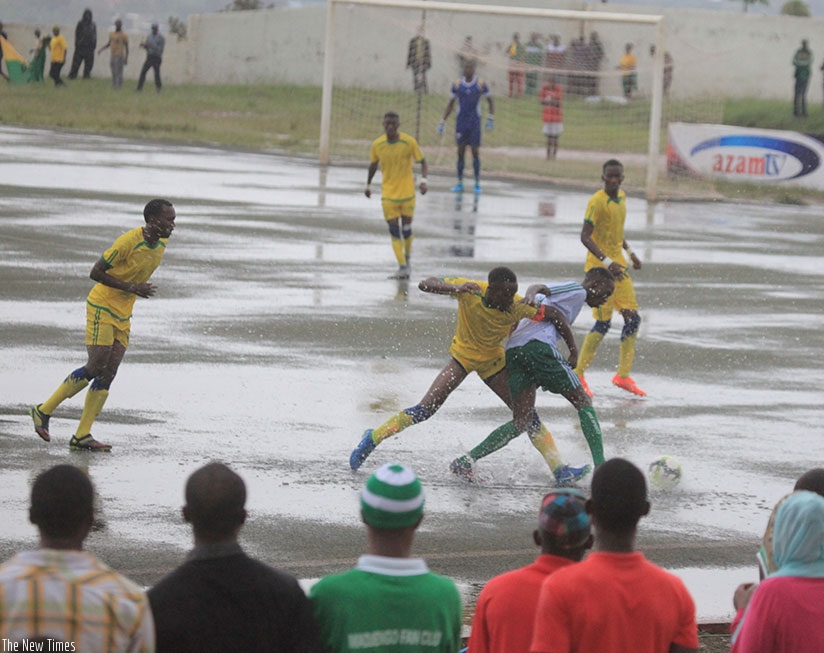 The game between league leaders SC Kiyovu and Marines FC on Saturday was washed off by the afternoon heavy downpour after 34 minutes. / Sam Ngendahimana