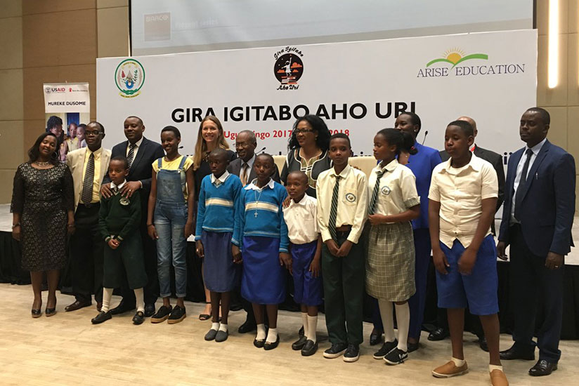 Young Rwandan writers posing for a group photo with various officials during Gira Igitabo Aho Uri campaign launch last week. (Photos by Diane Mushimiyimana)