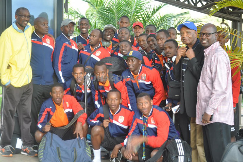 Isonga Academy players and officials at Kigali International Airport before departing to Cote d'Ivoire on Tuesday. (Courtesy)