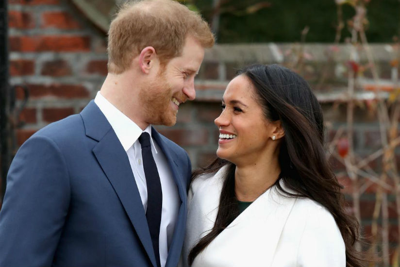 Prince Harry and Meghan Markle announcing their engagement at the Sunken Gardens at Kensington Palace on Nov. 27 in London. / Internet photo