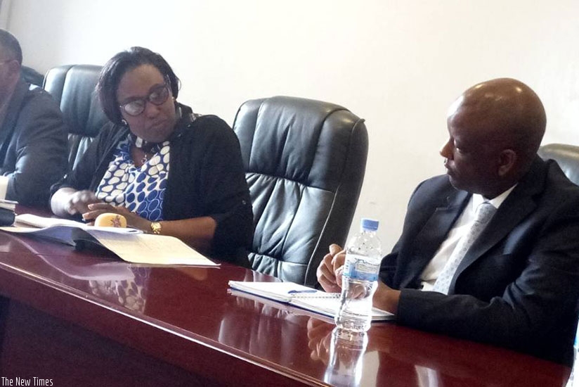 Mark Nkurunziza Chief Financial Officer in RDB, in a discussion with Alphonsine Mukarugema, Vice President of Committee on Social Affairs.
