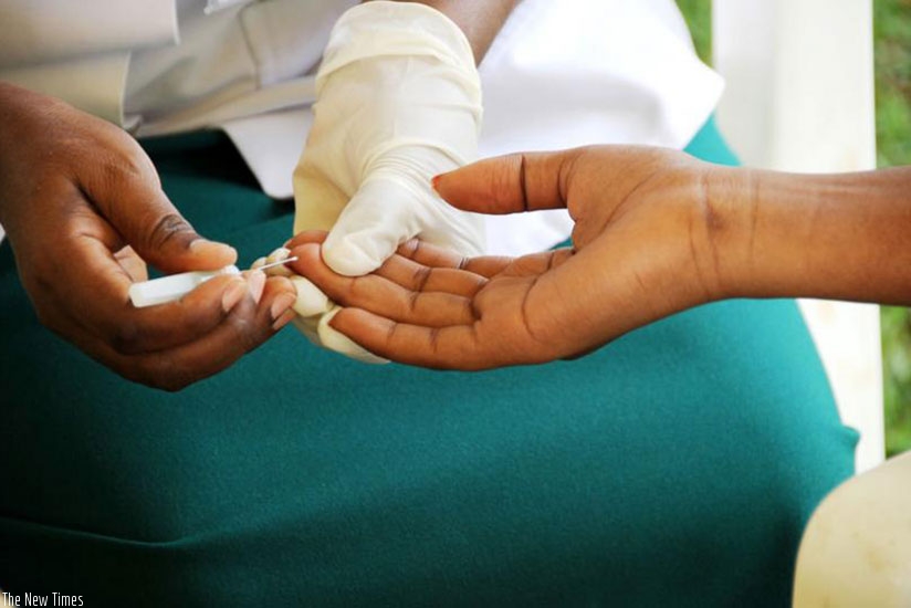 A volunteer tests for HIV at KingFaisal Hospital, Kigali. File.