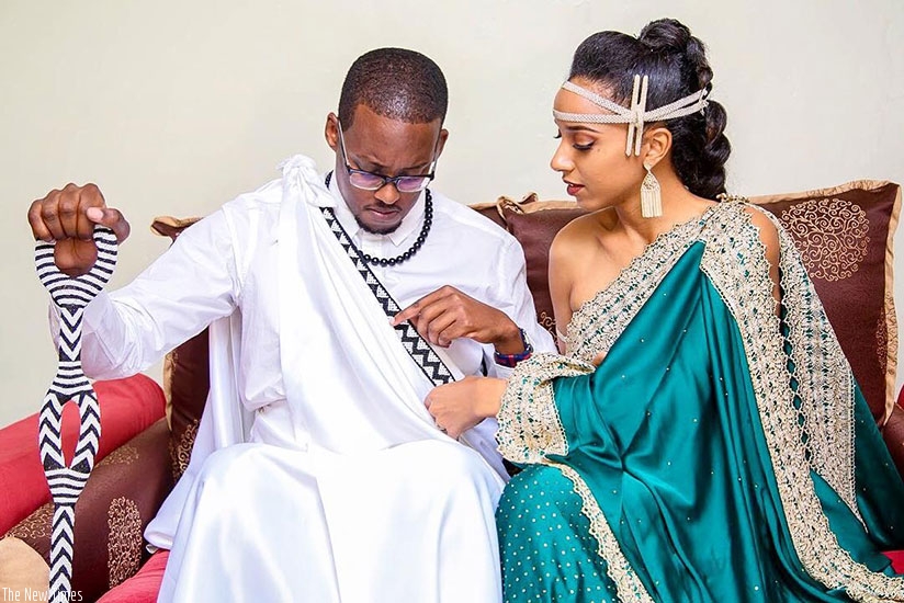 DJ Makeda Mahadeo, and her husband Sacha Haguma at their traditional wedding ceremony in Kigali, early this week. Courtesy.