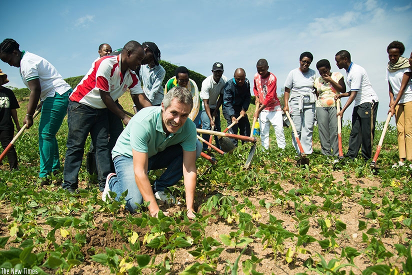 King Faisal officials and staff planting trees during Umuganda last week. The country will host the first ever Rwanda Green Growth Week from December 4-8. / File