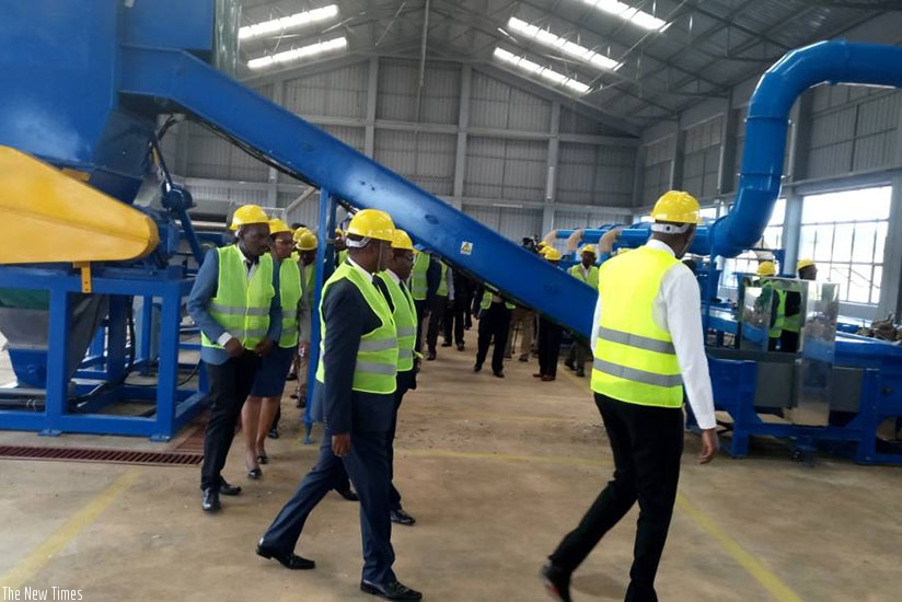 Officials tour the e-Waste recycling and dismantling facility in Bugesera (Photos by Jean d'Amour Mbonyinshuti)