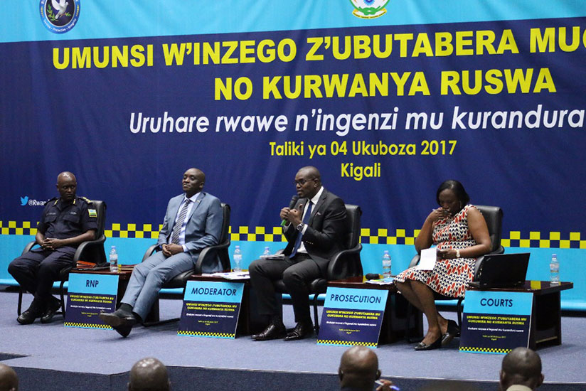 Prosecutor-General Jean-Bosco Mutangana (second right) speaks as the other panelists follow, at the meeting in Kigali yesterday. / Courtesy