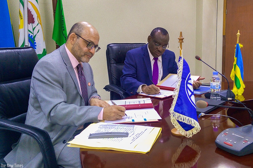 World Bank Country Director Yasser El-Gammal signs the financing agreement ,worth US$125m, with Finance Minister Claver Gatete in Kigali on Monday. / Faustin Niyigena