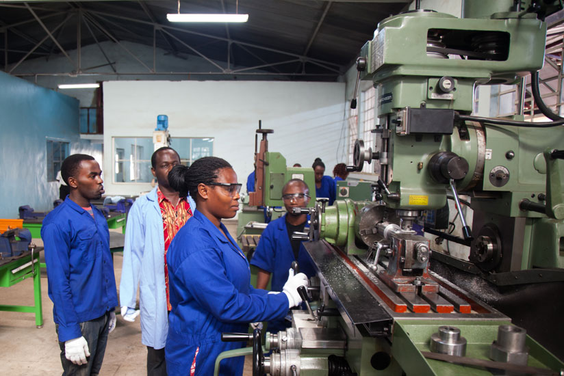 Marie Mukahirwa, a student at IPRC Kigali operates a machine in one of the workshops at Kicukiro campus.  